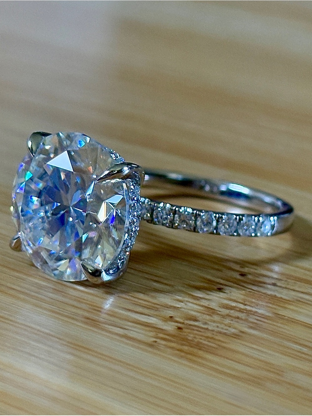 A 10ct round brilliant in an elevated mounting with pavé Moissanite hidden halo!